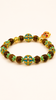Open Sky naturally aromatic agarwood bracelet with lake-blue enamel details