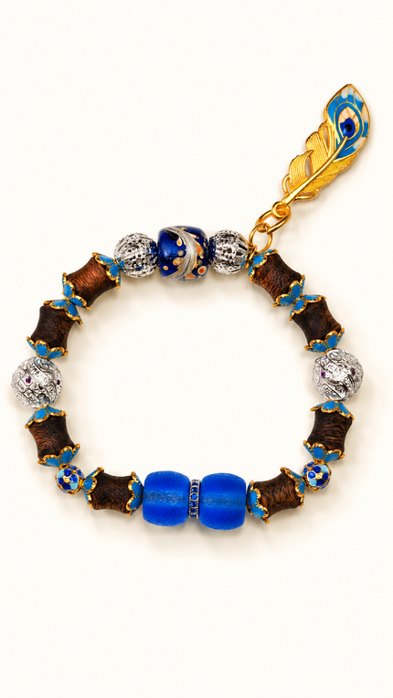 Deep Current naturally aromatic agarwood bracelet with deep-blue glass and feather charm