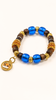 Quiet Tide naturally aromatic agarwood bracelet with royal-blue glass beads and playful charm