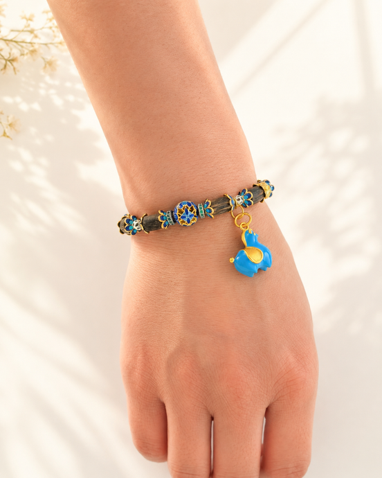 Open Possibility agarwood bracelet worn on wrist
